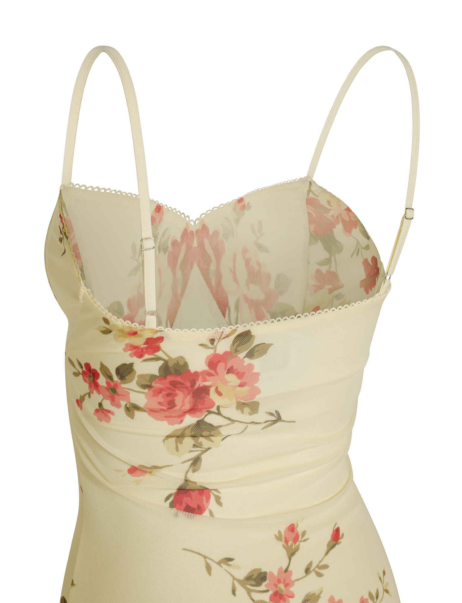 A close-up of the TIGERMIST JULIANNA DRESS in yellow with macro pop floral print, featuring adjustable spaghetti straps and a scalloped neckline for an elegant finish.