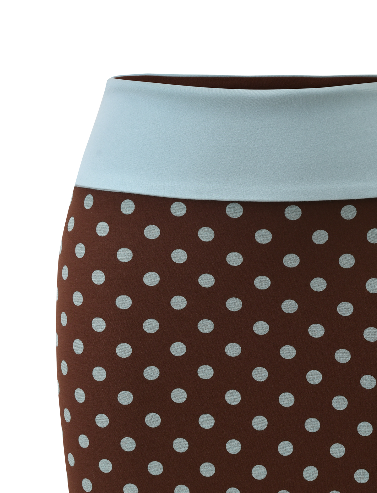 A close-up of the TIGERMIST IMOGEN MINI SKIRT - BROWN AND BLUE POLKA DOT, featuring a wide light blue waistband, shown against a plain white background.