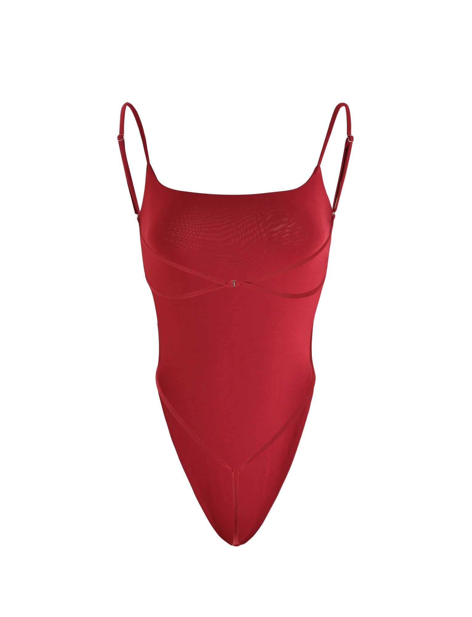 The MINERVA BODYSUIT in red from TIGERMIST features thin shoulder straps, a scoop neckline, and a high-cut leg. The fabric is smooth, stretchy, and free of visible patterns or embellishments.