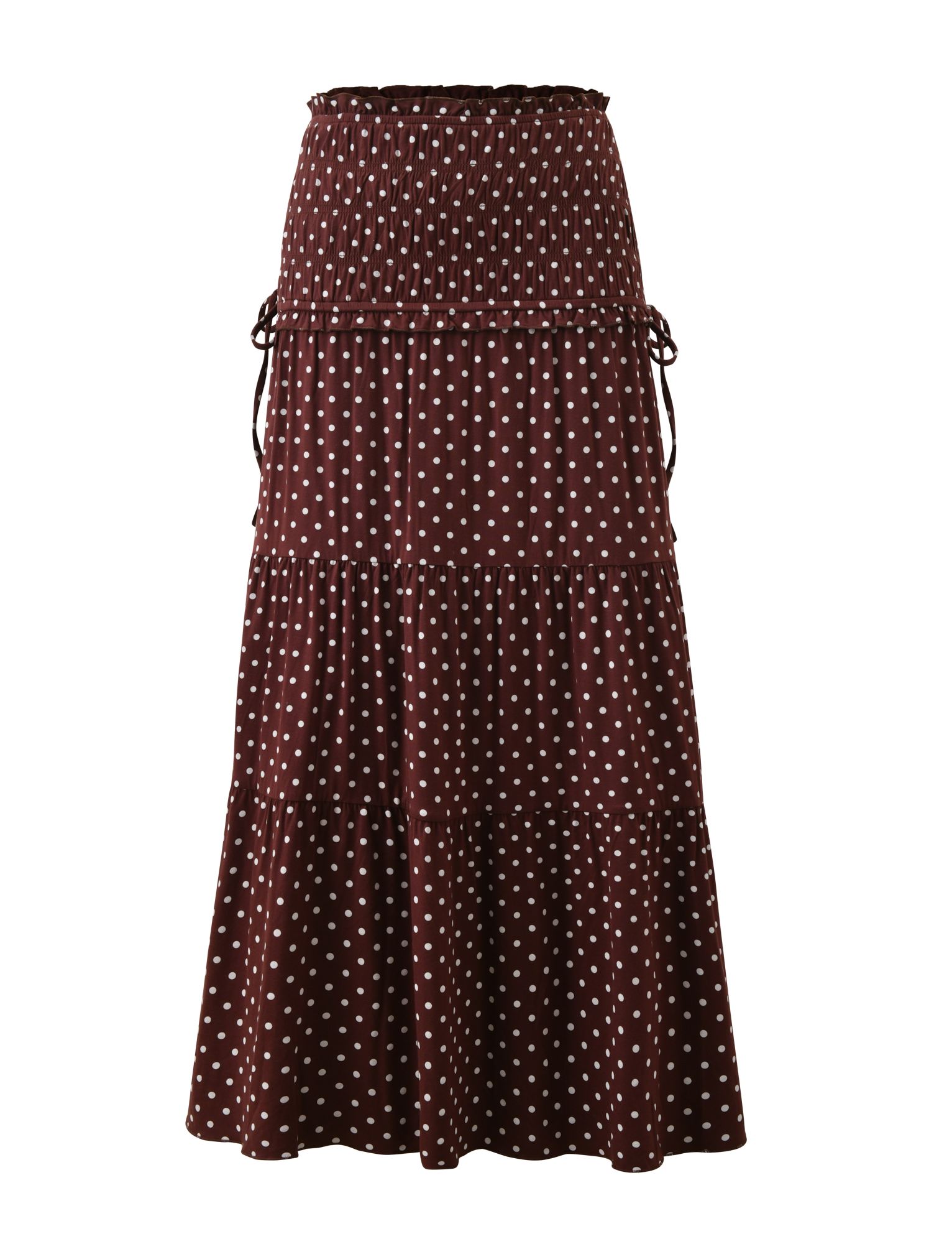 The TIGERMIST DENALI MAXI SKIRT - BROWN DOT is an ankle-length, tiered skirt featuring a white polka dot print, shirred waistband, and adjustable side drawstrings.