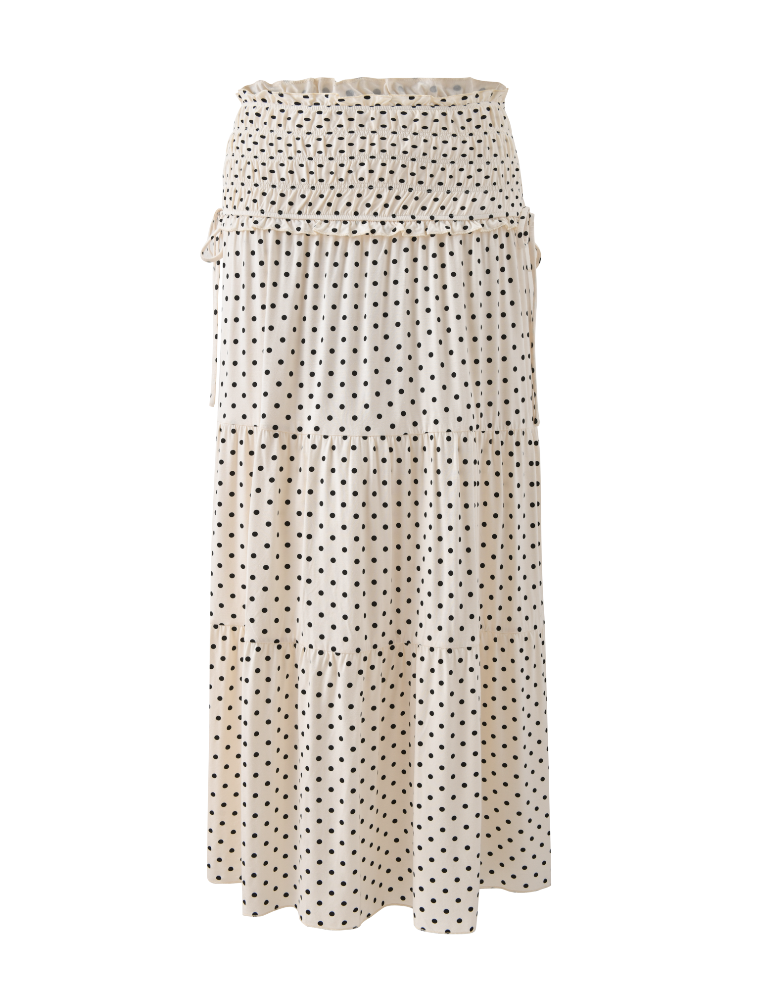 The TIGERMIST DENALI MAXI SKIRT - CREAM DOT is a cream polka dot, tiered maxi skirt with a smocked waistband, made from soft modal fabric and shown on a white background.