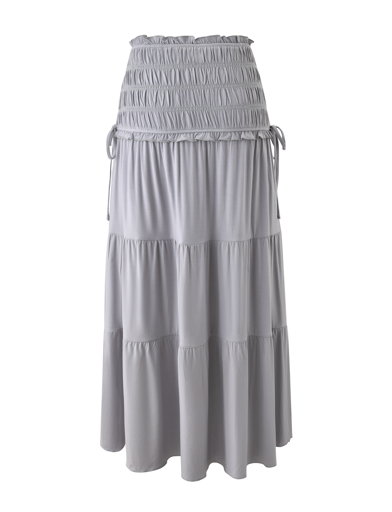 The TIGERMIST DENALI MAXI SKIRT in Dove Grey features soft modal fabric, a shirred waistband, tiered layers, adjustable side ties, and a flowy, relaxed fit with gathered texture for easy style.