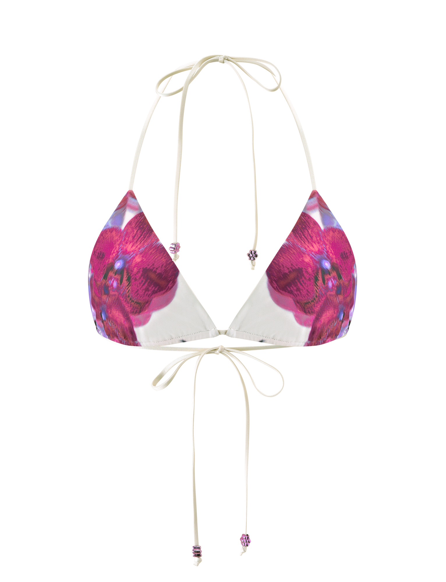 The AVE BIKINI TOP – ORCHID HAZE by TIGERMIST is a triangle bikini top with thin cream straps, a pink floral orchid haze print, and beaded accents on the neck and back tie ends.