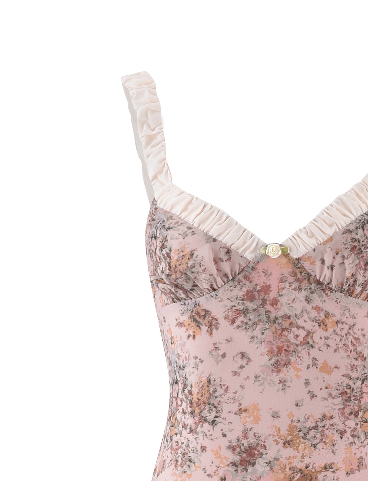 A close-up of the TIGERMIST AMARAN DRESS - PINK : CAMO FLORAL, featuring a fitted bodice, ruffled white shoulder straps, and a small decorative rose in the center.