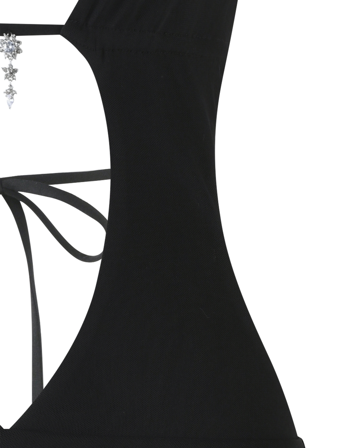 Close-up of the back of the TIGERMIST ESHA DRESS - BLACK featuring cut-out details, halter straps with thin ties, and part of a decorative necklace with dangling crystals at the neckline.