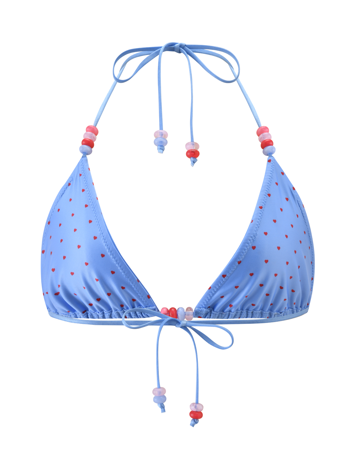 The FINLEA BIKINI TOP by TIGERMIST features a blue halter neck design with heart-shaped red polka dots, adjustable strings, and pink and red bead accents, shown against a plain white background.