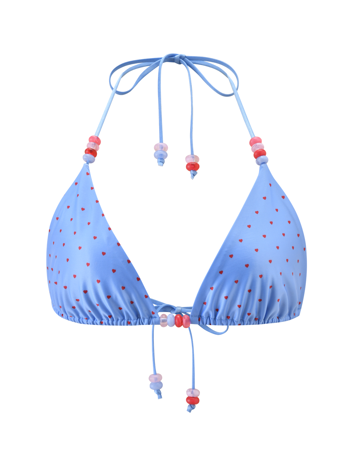 The FINLEA BIKINI TOP - BLUE HEART POLKA DOT by TIGERMIST is a light blue triangle bikini top with heart polka dots, adjustable halter neck, front ties with pink, red, and purple beads. Shown on a plain white background.