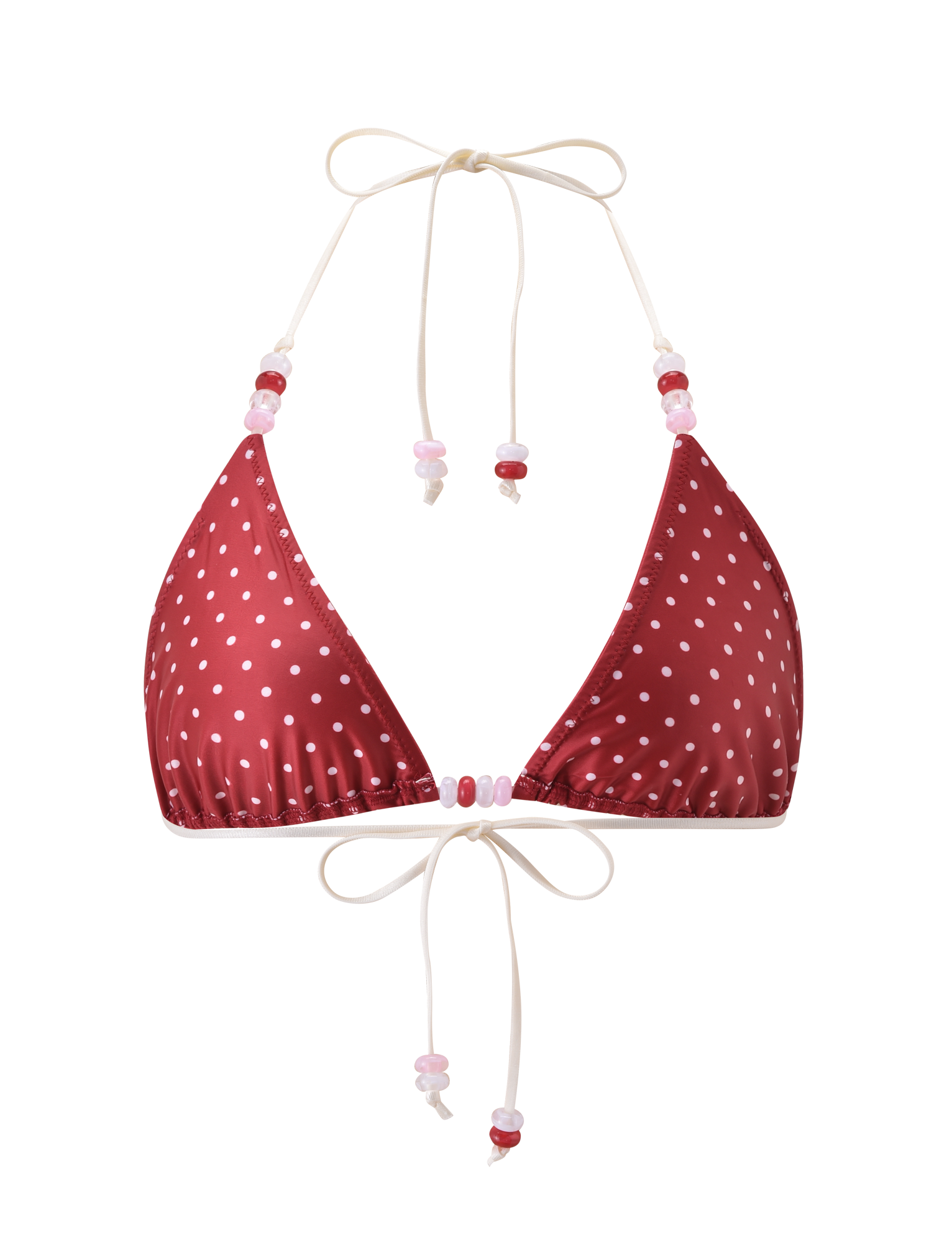 The FINLEA BIKINI TOP by TIGERMIST features a red and cream polka dot design, white halter neck straps, and pink and red beads on the ties. This triangle bikini top is shown against a plain white background.