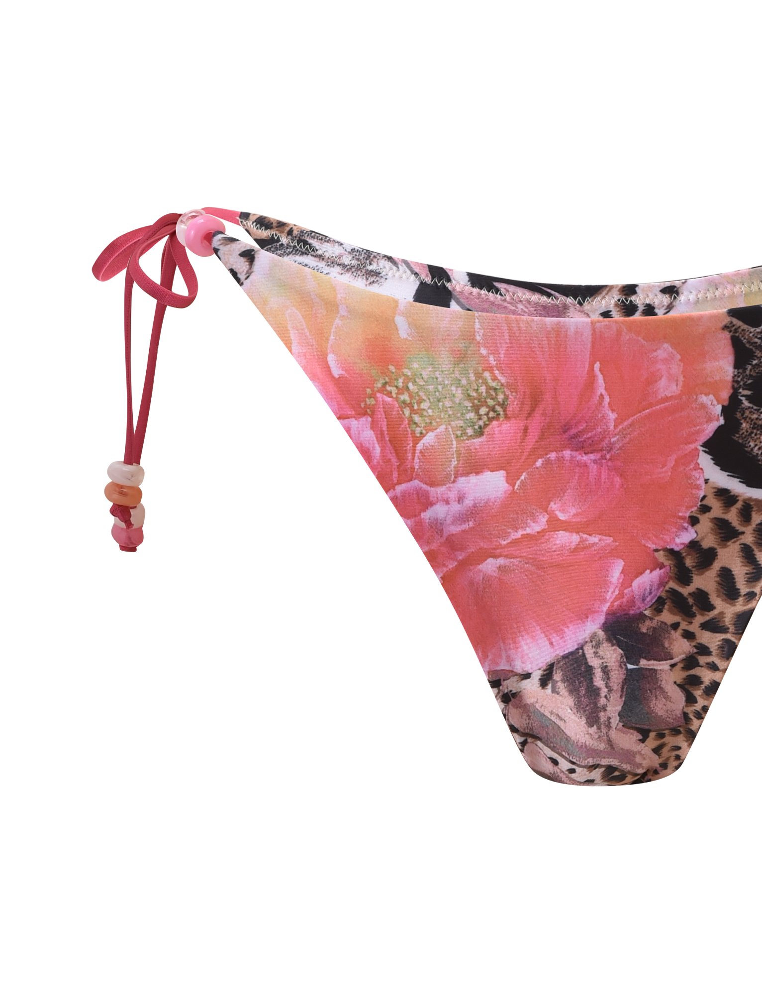 A close-up of the TIGERMIST FINLEA BIKINI BOTTOM - ANIMALIER FLORAL shows its vibrant floral animal print, pink string tie, and decorative beads on the side, set against a white background.