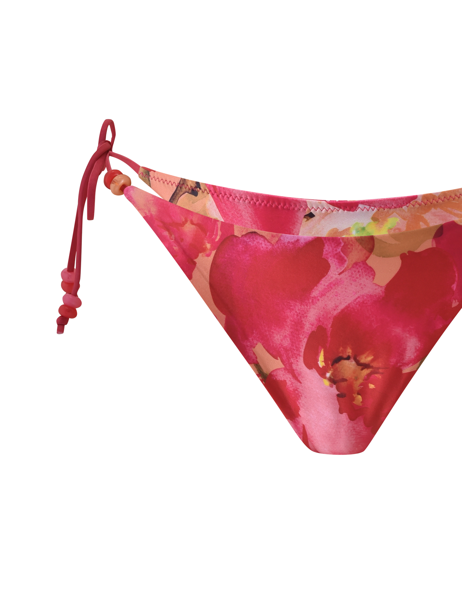 A close-up of the TIGERMIST FINLEA BIKINI BOTTOM - DAIQUIRI FLORAL, a cheeky brief with a pink floral watercolor print and red side tie, shown on a plain white background.