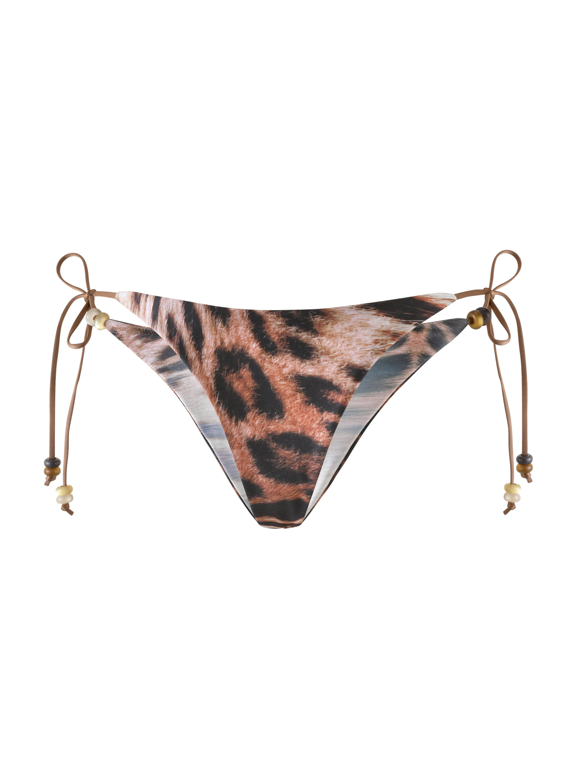 The FINLEA BIKINI BOTTOM in Leopard Haze by TIGERMIST features a cheeky cut, brown side ties with small beads, and is displayed on a white background.