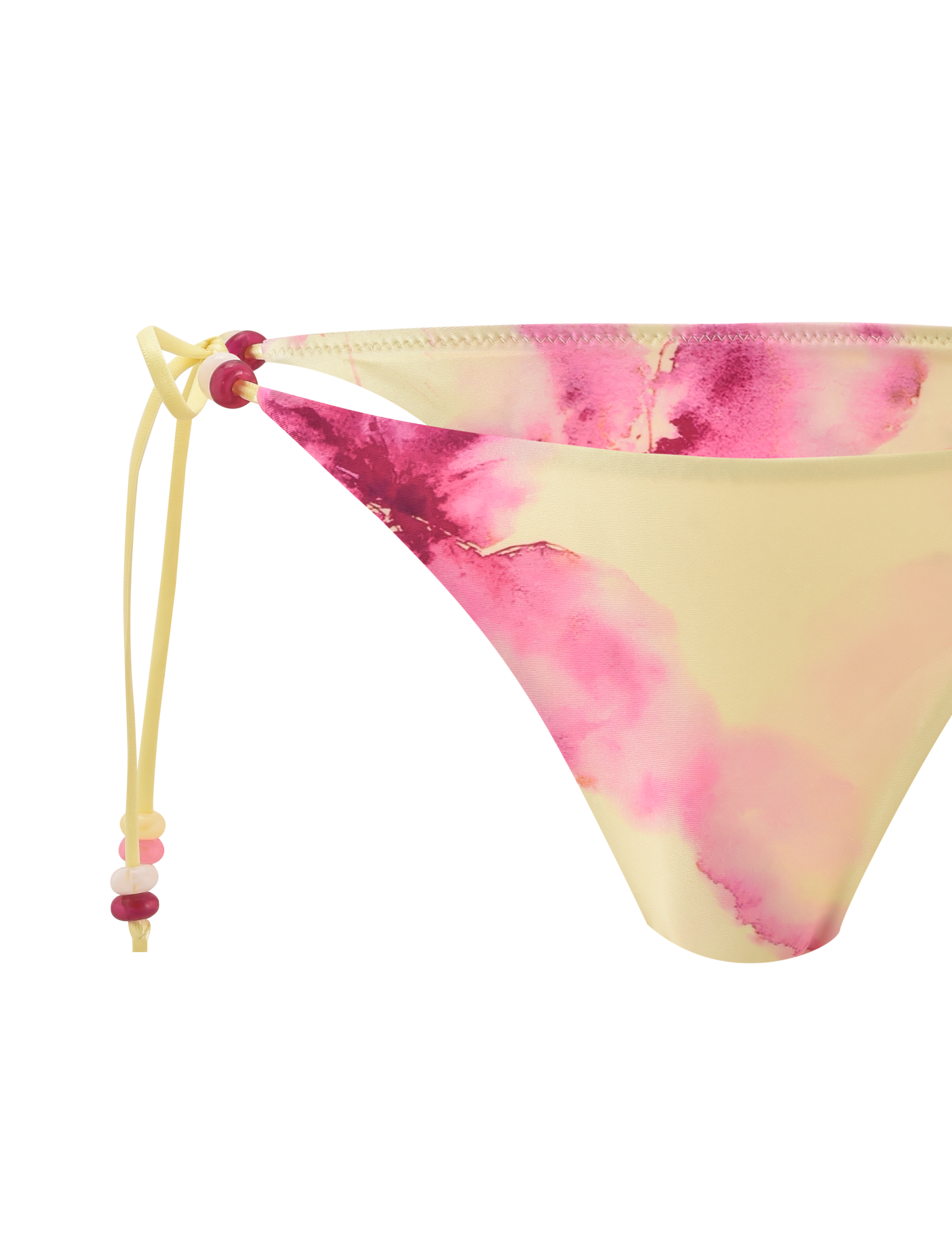 The FINLEA BIKINI BOTTOM - WATERCOLOUR FLORAL by TIGERMIST features a cheeky yellow design with pink watercolor patterns and a side tie, finished with pink and red beads.