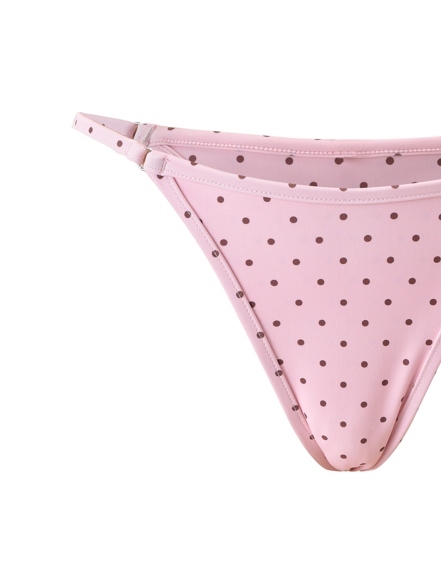Close-up of the TIGERMIST DIANA SWIM SKIRT SET in pink polka dot, featuring playful detailing, shown against a plain white background.