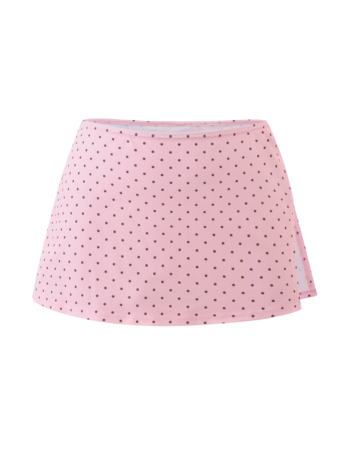 The DIANA SWIM SKIRT SET by TIGERMIST features a pink mini skirt with an A-line shape and evenly spaced black polka dots, inspired by a playful bikini. Its clean waistband offers a simple, chic finish without visible embellishments.