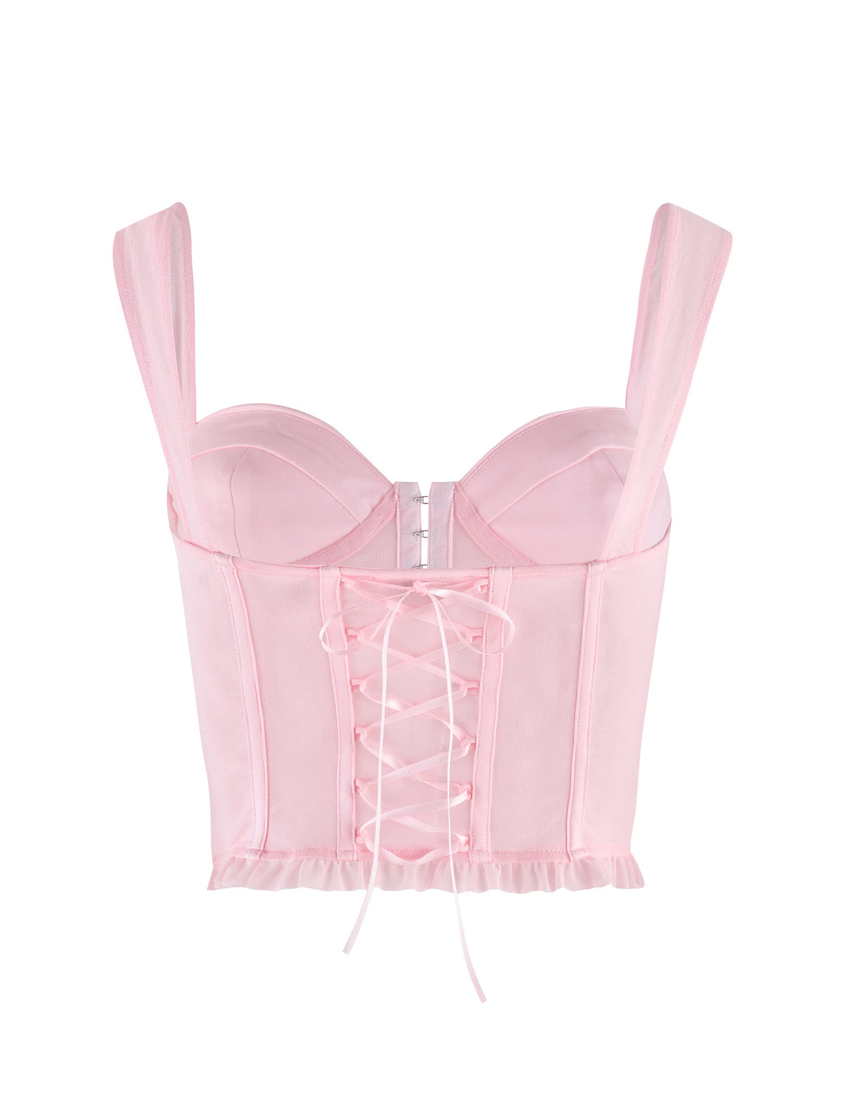 The TIGERMIST GINNY TOP in baby pink is a satin corset with a sweetheart neckline, wide straps, underwire cups, front hooks, center lace-up detail, and a ruffled hem.