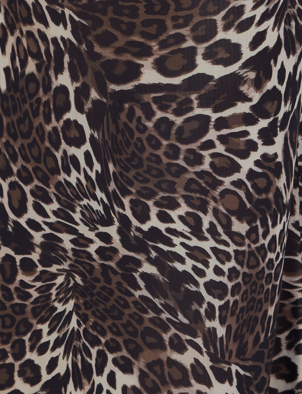 Close-up of TIGERMIST's PEARL MAXI SKIRT - MULTI : LEOPARD, showcasing a brown, black, and beige leopard print with varied spots and rosettes—ideal for statement maxi looks.