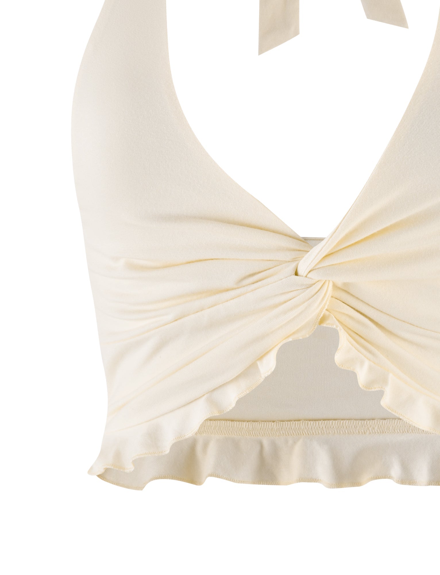 The KATYA HALTER TOP by TIGERMIST in cream showcases a buttery jersey fabric with a twisted knot at the front for a charming gathered effect, soft and stretchy material, and a slightly ruffled hem.