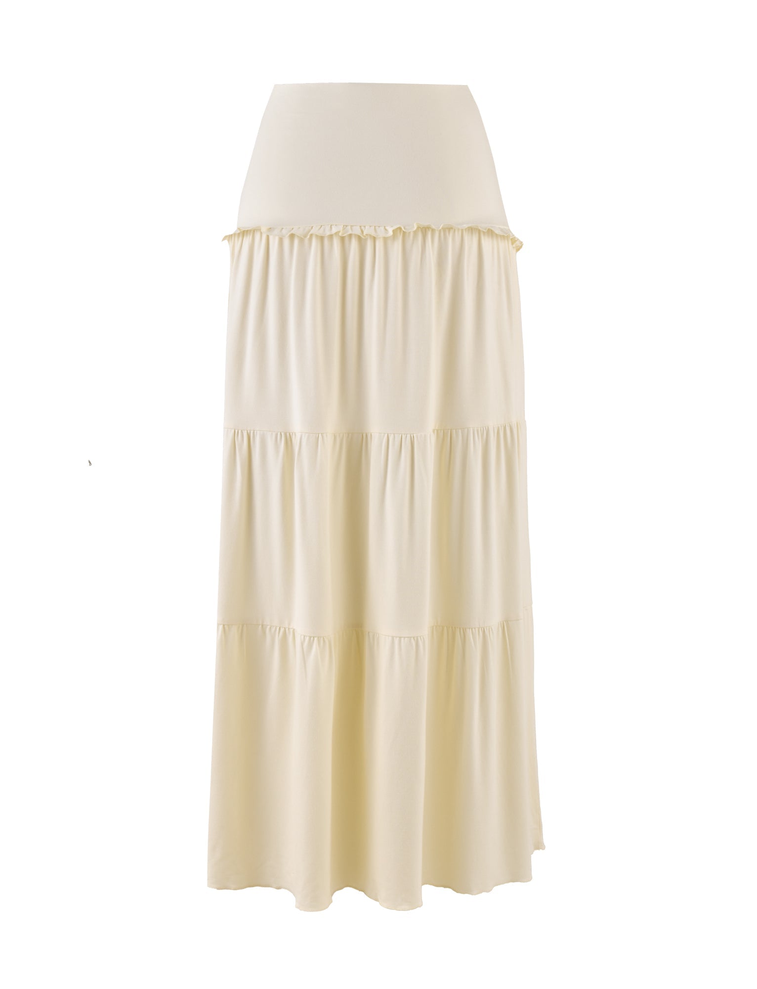 The TIGERMIST KATYA MAXI SKIRT in Cream features a high waistband and tiered, flowing design. Its lightweight fabric with a subtle twist drapes elegantly, adding sophistication.