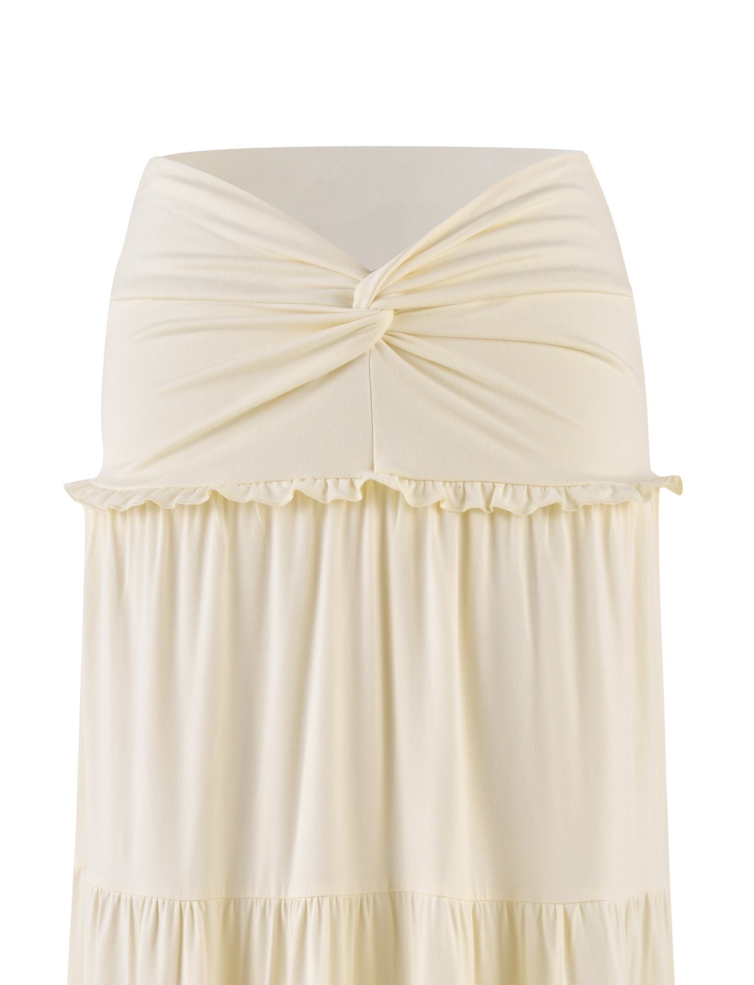 The image showcases the "KATYA MAXI SKIRT - WHITE : CREAM" by TIGERMIST, a beige strapless dress with a twist detail and ruffled design. Made from high-stretch fabric, it has a soft, gathered look against a plain white background.