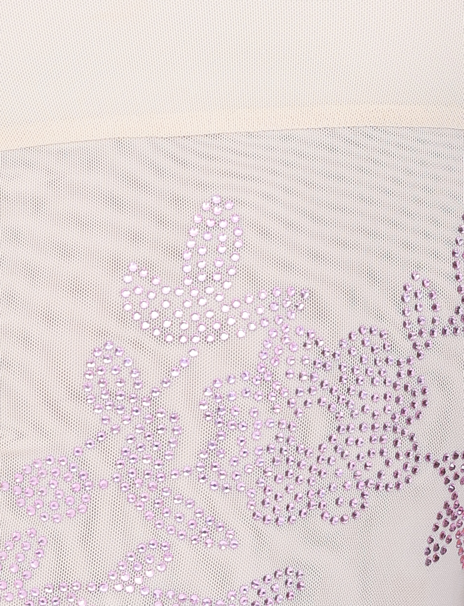 Close-up of the OCTAVIA TOP - NEUTRAL: CREAM by TIGERMIST, featuring sheer beige mesh fabric adorned with shiny purple sequin floral and leaf patterns.
