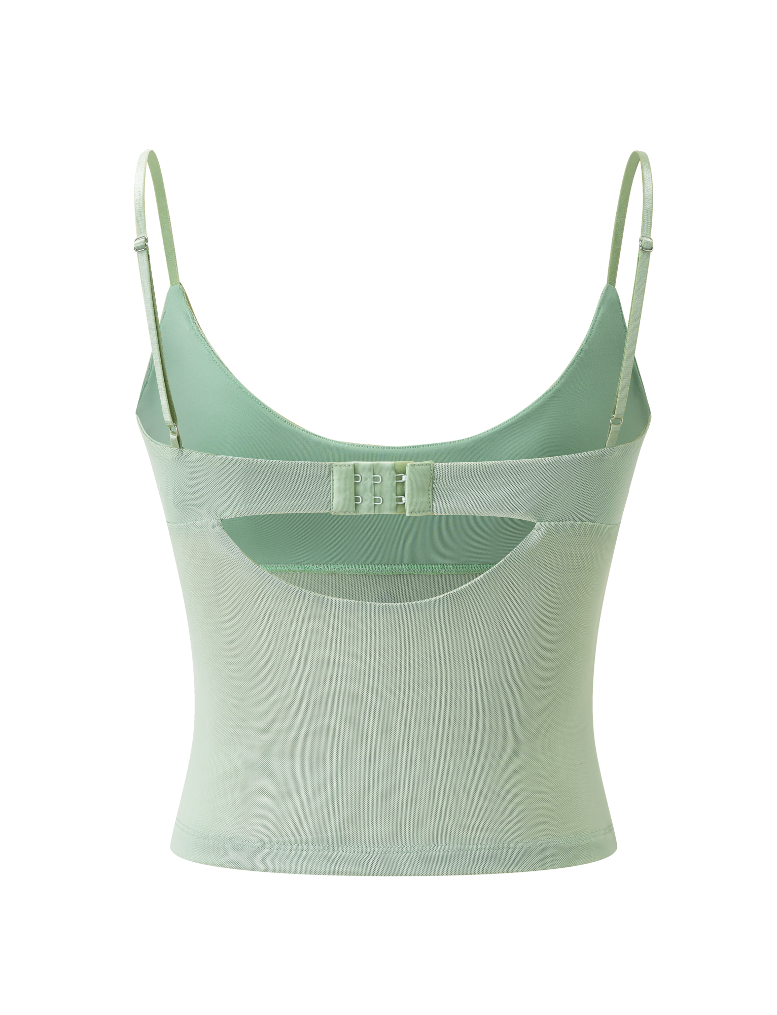 The OCTAVIA TOP - PISTACHIO by TIGERMIST is a pastel green mesh camisole with adjustable straps, scoop back, hook-and-eye closure, fitted semi-sheer design, and delicate floral embellishments.