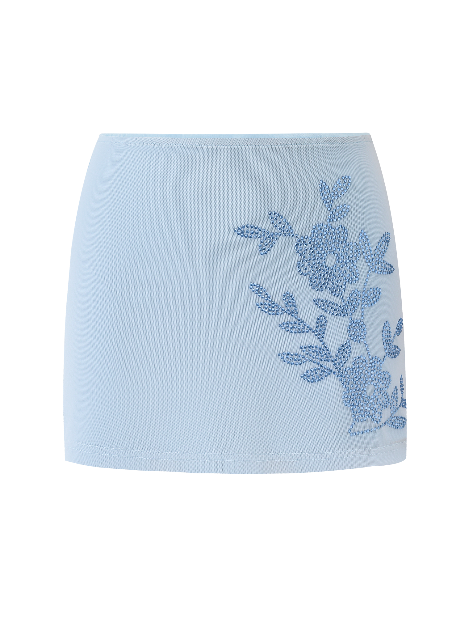 The TIGERMIST OCTAVIA MINI SKIRT - BABY BLUE features a subtle texture, a blue floral rhinestone embellishment, and a fitted, elegant silhouette inspired by the Octavia Dress.