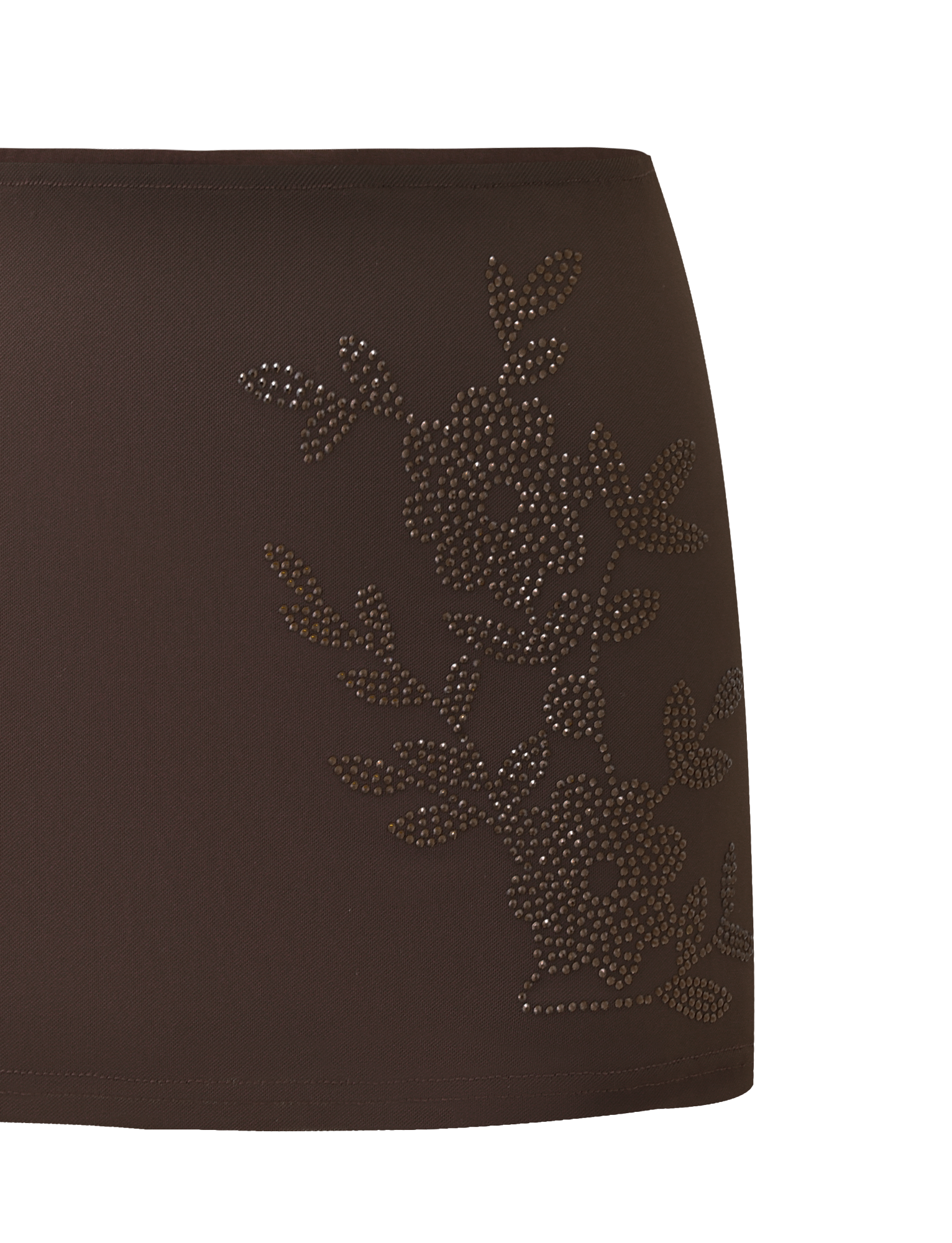 Close-up of the TIGERMIST OCTAVIA MINI SKIRT - CHOCOLATE SPARKLE, a brown fabric mini skirt with a form-fitting design and floral embellishments made of small, shiny studs on the right side for subtle sparkle.
