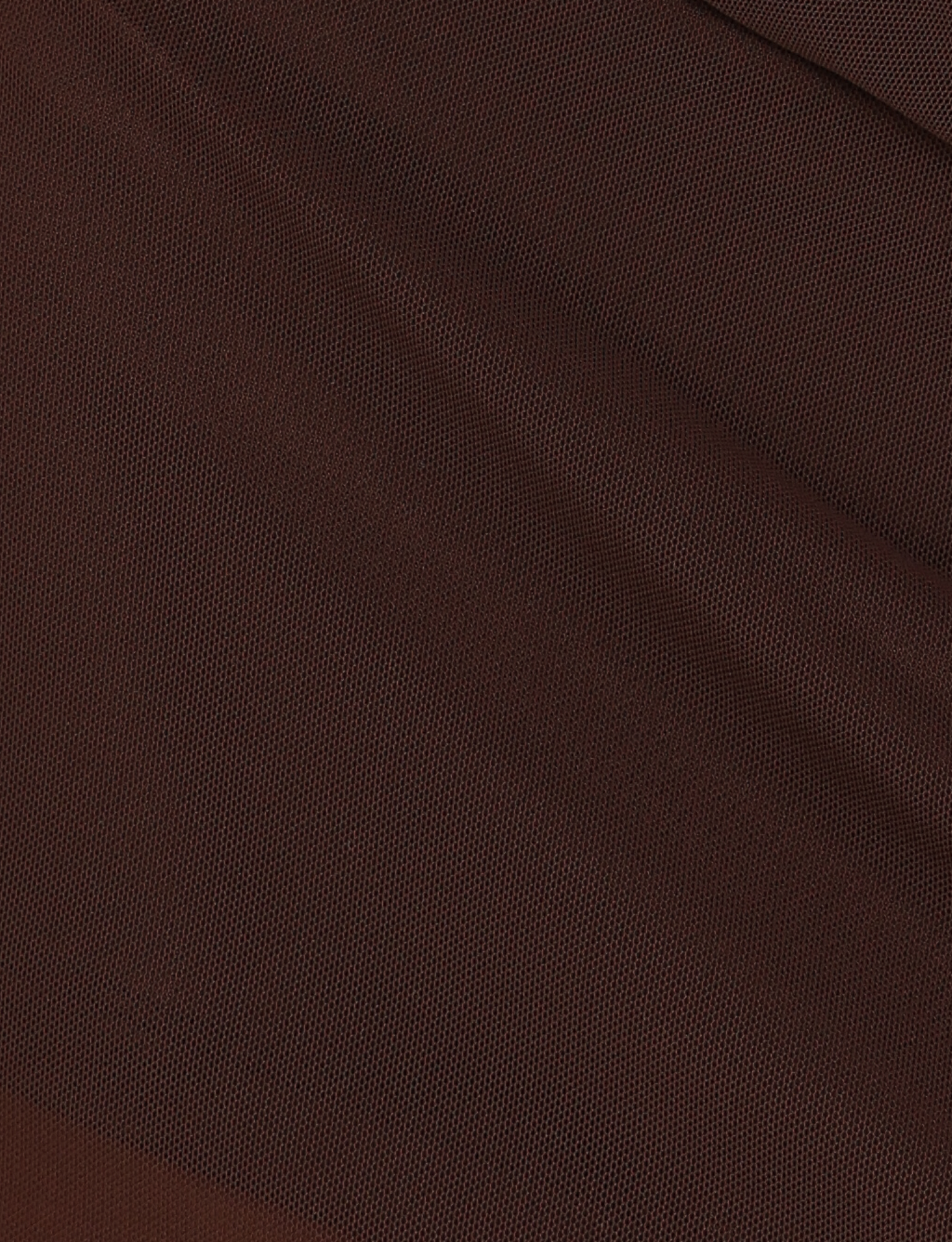 Close-up of the TIGERMIST OCTAVIA MINI SKIRT - BROWN : CHOCOLATE shows its fine weave and diagonal seam, highlighting the detailed chocolate brown fabric—perfect for a chic look.