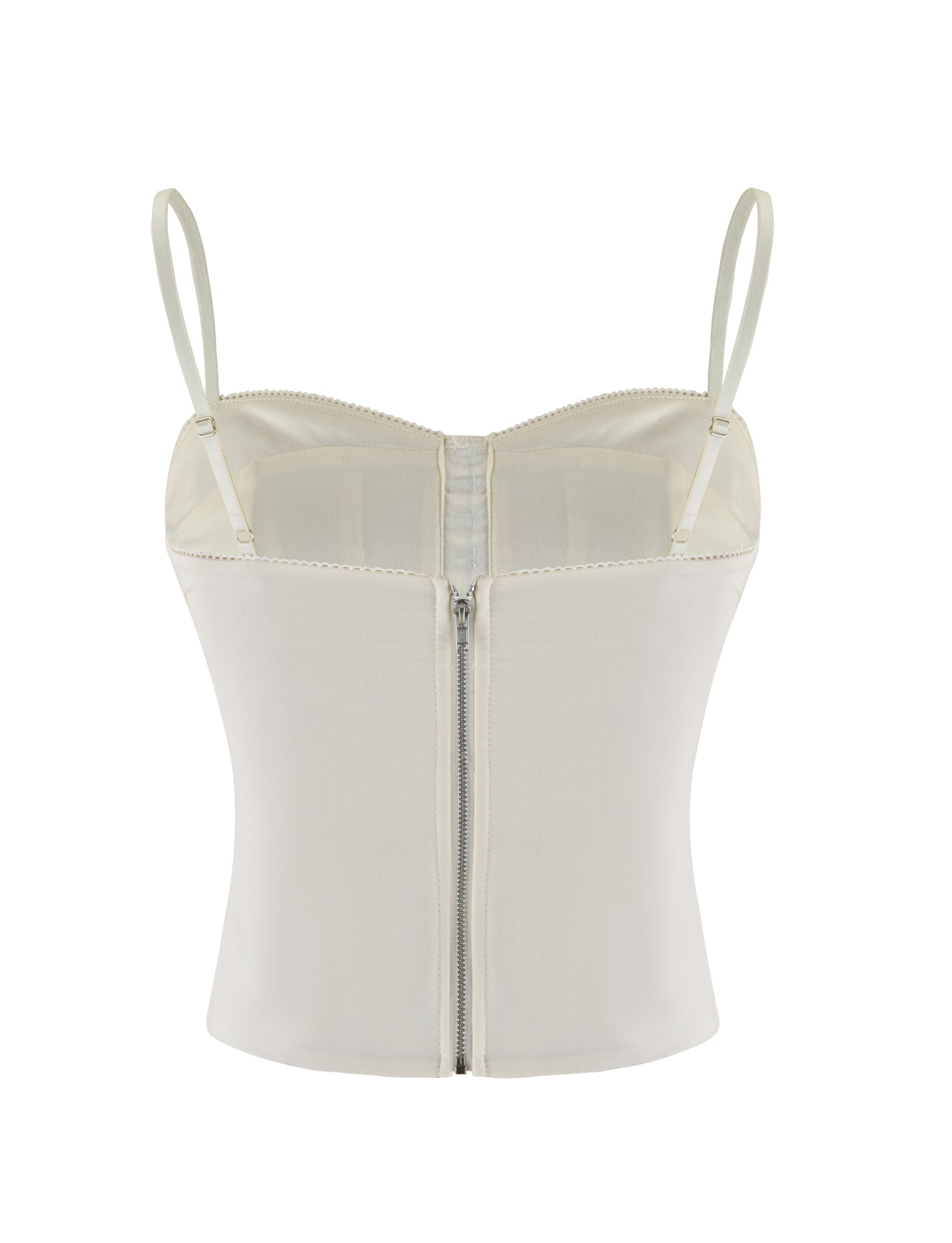 The TIGERMIST ANTONELLA TOP in white is a fitted corset-style piece with adjustable spaghetti straps, seam details, and a front zipper, made from soft touch suiting fabric and shown on a plain white background.