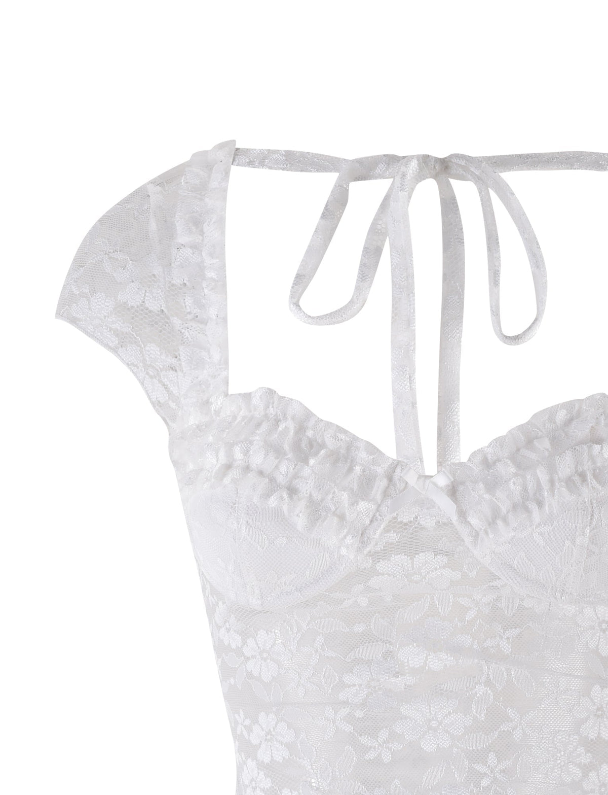 Close-up of the NYRA TOP in white by TIGERMIST, showcasing ruffled cap sleeves, a sweetheart neckline, floral lace pattern, bustier-style bodice, and a tie-back neck detail.