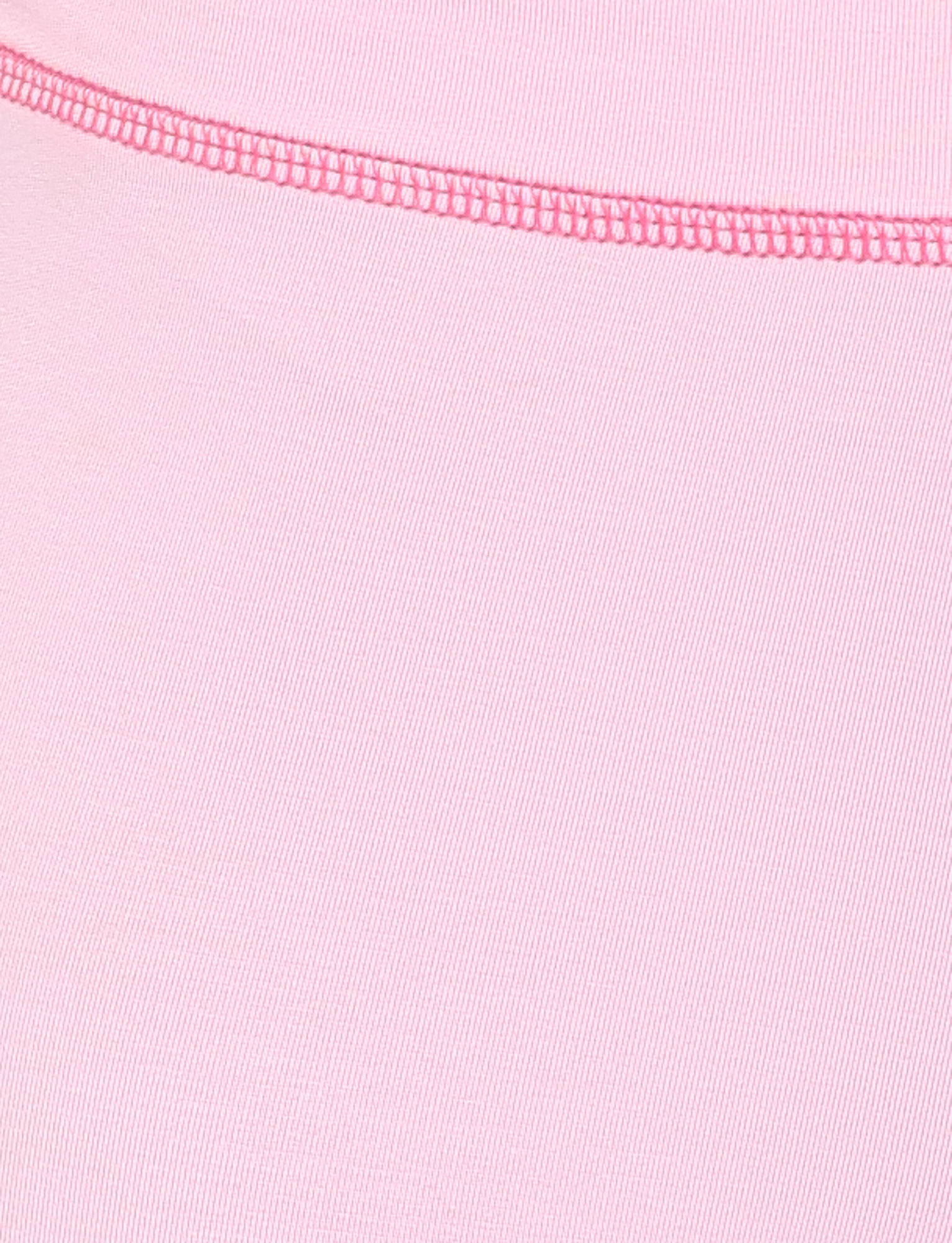 Close-up of the TIGERMIST BLAYZE HOODIE in Soft Pink shows the light pink fabric and curved seam stitched in darker pink thread near the top edge, highlighting the texture and stitching detail.