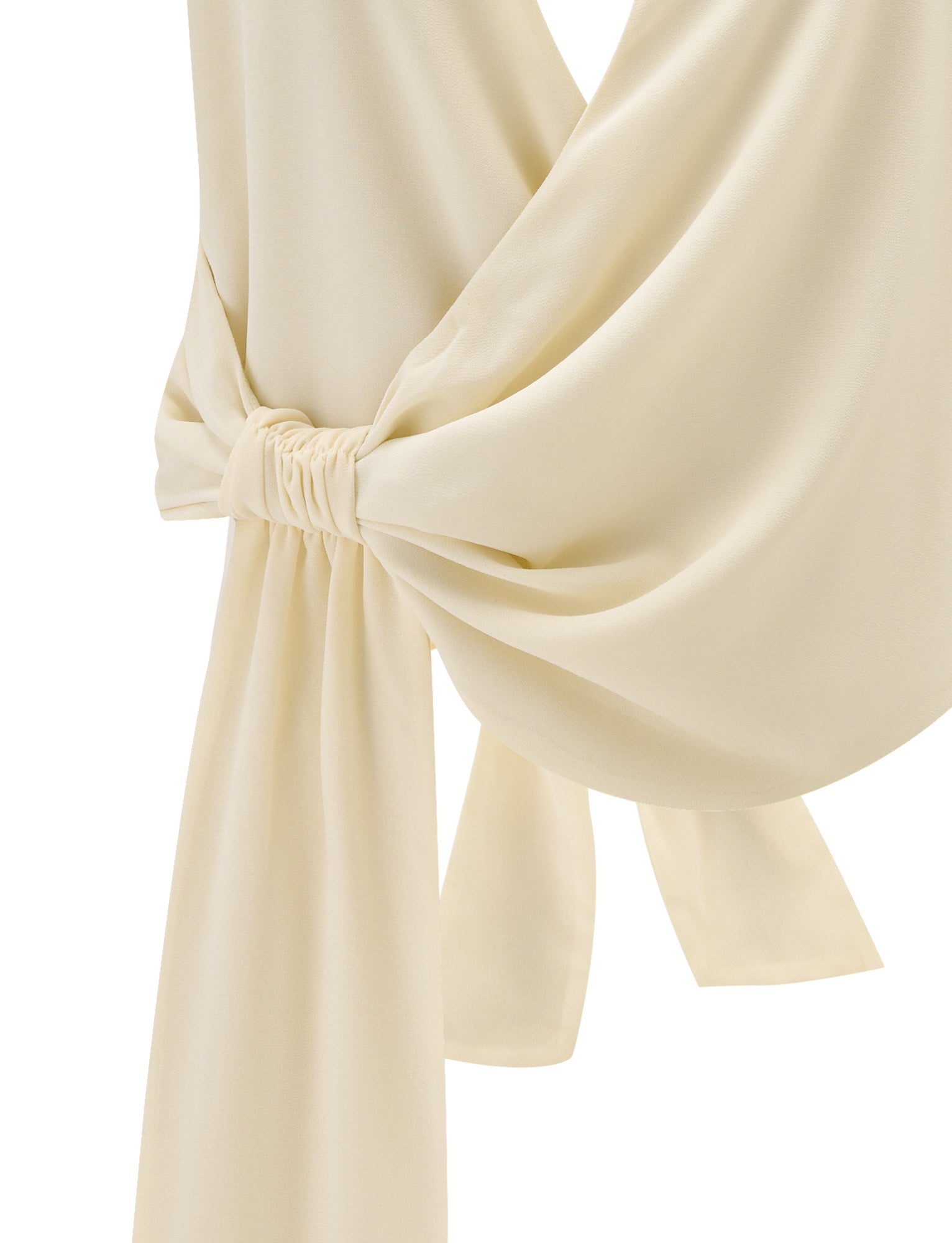 Close-up of the TIGERMIST INDIGO TOP - IVORY, a cream chiffon halter neck blouse with a gathered knot detail and flowing loose ends, offering an elegant, adjustable fit.