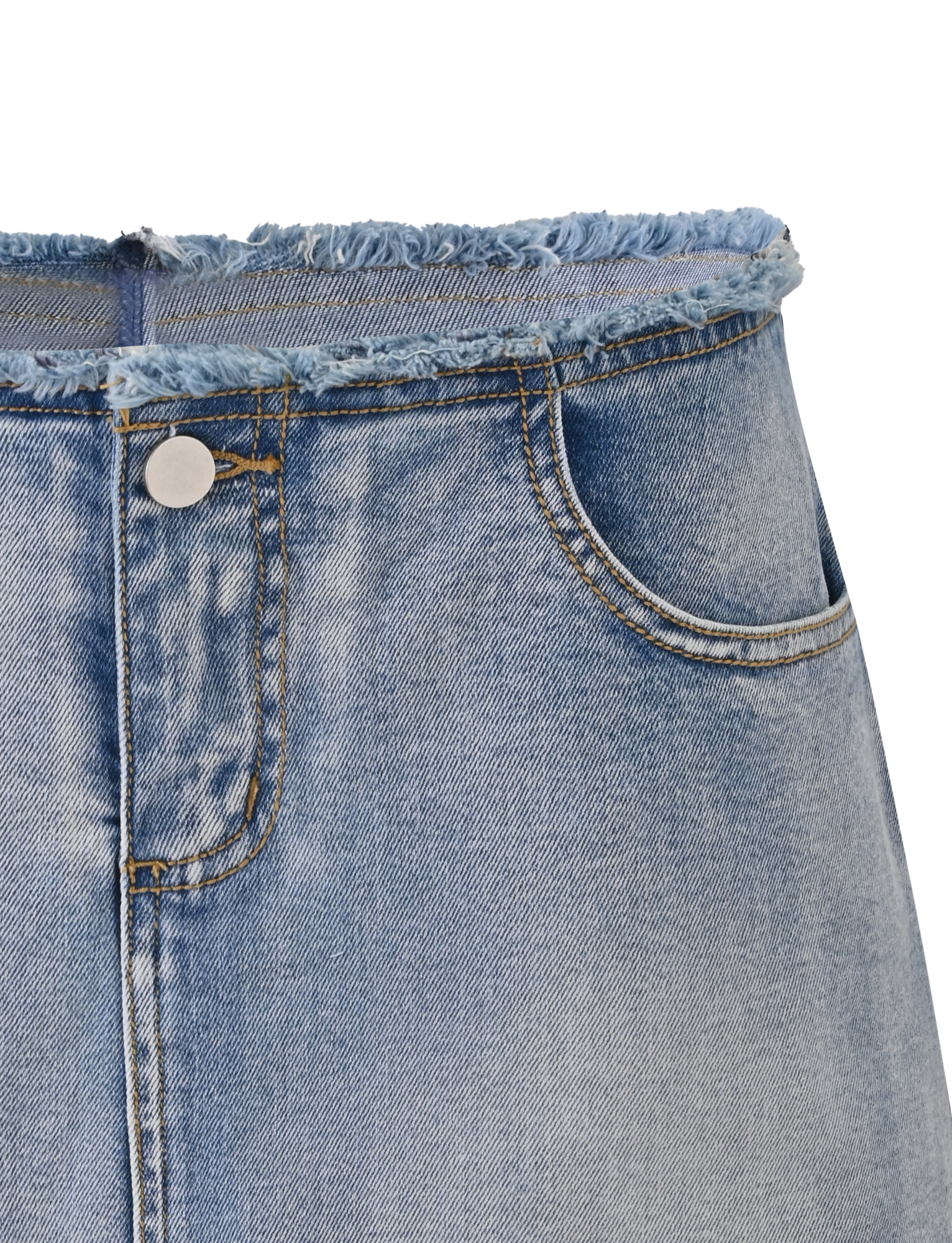 Close-up of the TIGERMIST OPHELIE SKORT - DENIM, a light blue denim mini skort with a frayed waistband, front button, visible stitching, pocket detail, and a faded, worn texture.