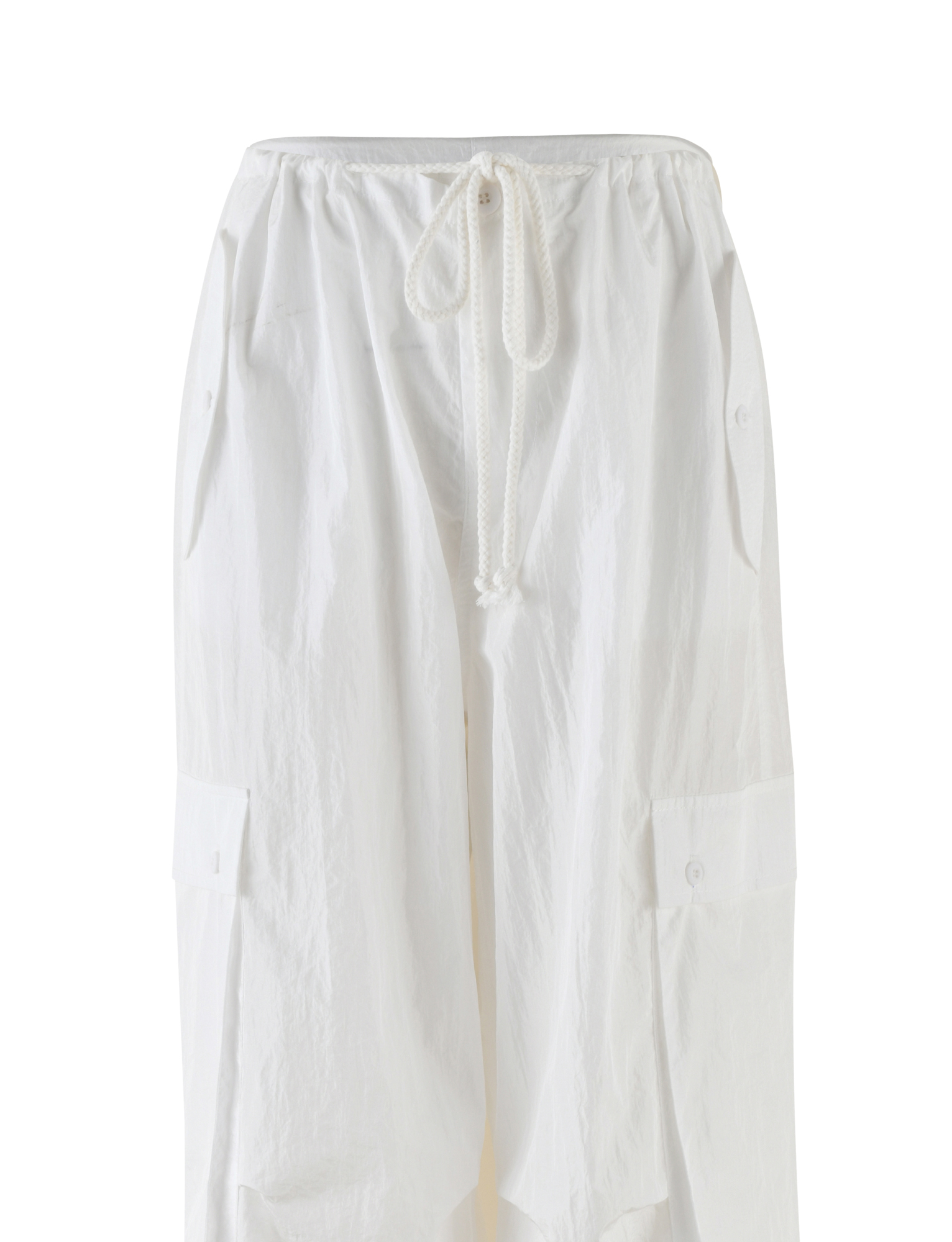 The TIGERMIST VIOLETTE PANT - WHITE features lightweight nylon, an elastic waistband with rope drawstring, two large side pockets with button flaps, and a low-rise relaxed fit. Shown on a plain white background.