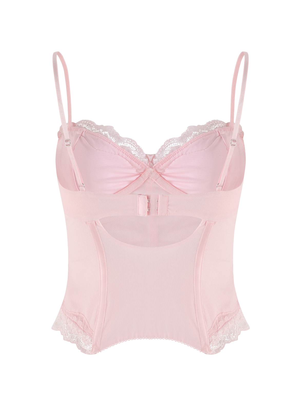 The NILA CORSET TOP by TIGERMIST in soft pink features lightweight jersey, sheer mesh panels, lace trim, adjustable straps, and a front clasp for a delicate, feminine look.