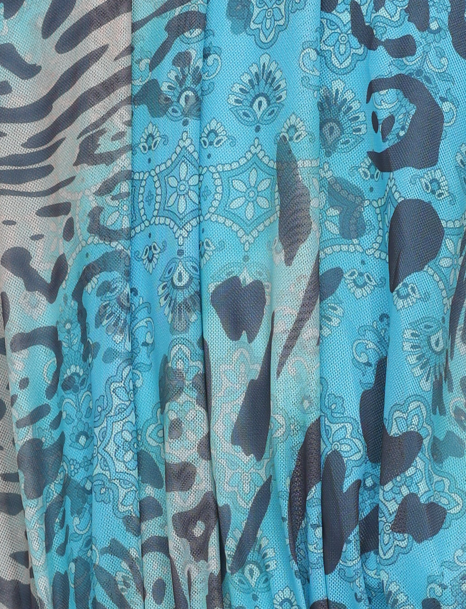 The EVANNA MINI DRESS - MULTI: LEOPARD SWIRL by TIGERMIST features blue, black, and gray leopard and paisley prints in a flattering bodycon fit—perfect for making a bold statement.