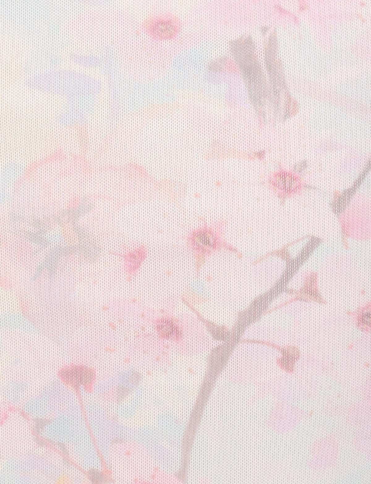 The LONIE MIDI SKIRT by TIGERMIST features a washed cherry blossom floral print in soft pastels, with delicate pink and white flowers, a textured background, dotted overlay, and lace trim details for an exclusive airy look.
