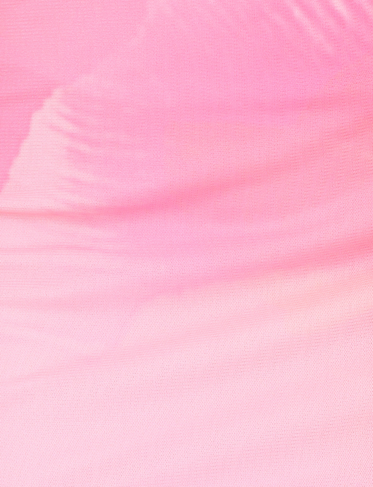 Close-up of the TIGERMIST SARIAH TOP in Macro Floral Pink Blossom, showcasing its flowing, textured pink fabric with gentle folds and soft lighting for a smooth, delicate look.