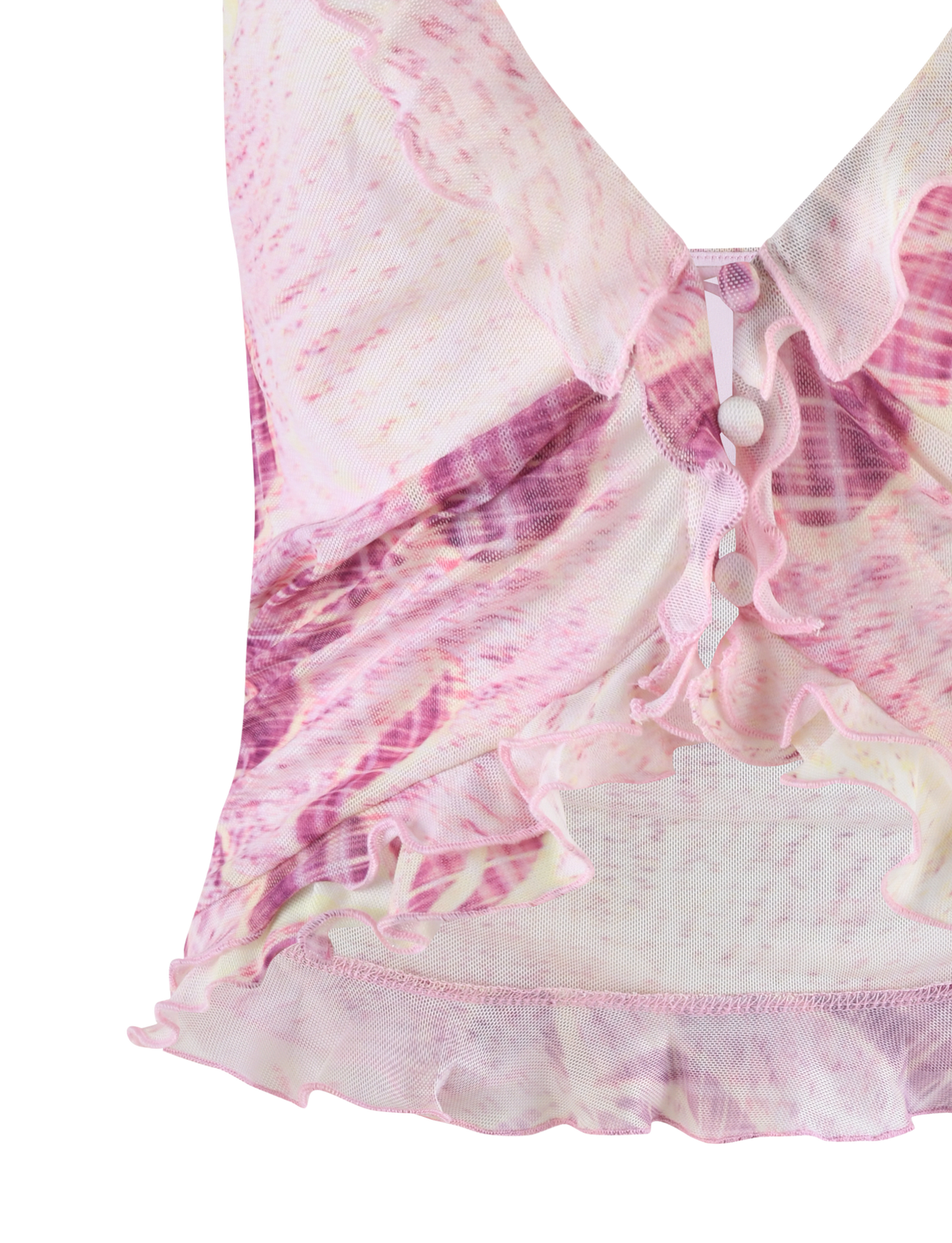 A close-up of the TIGERMIST DALILA TOP in Grunge Floral Magenta, showcasing its sheer fabric, exclusive pink and purple floral print, decorative buttons, and ruched frilled design.