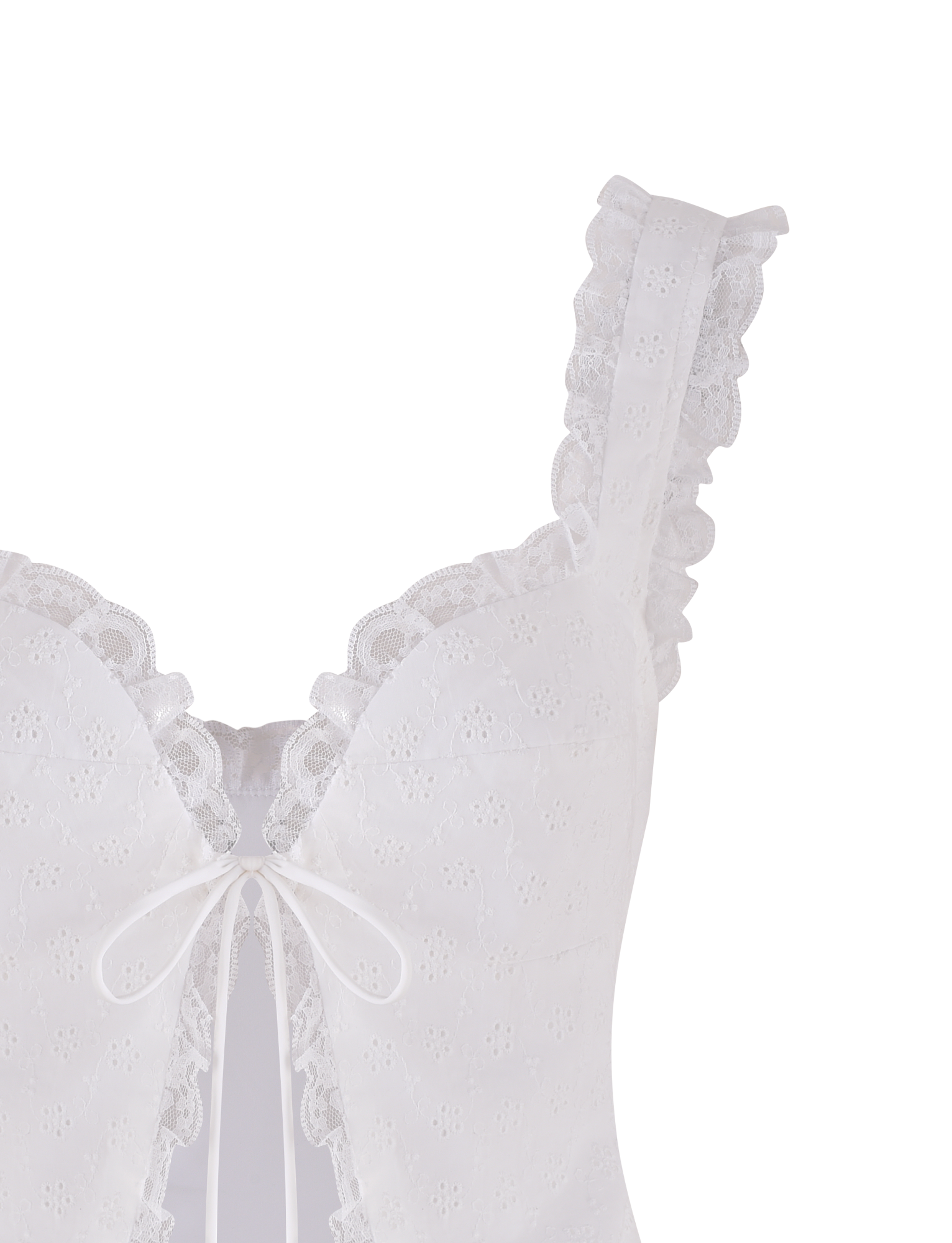 The KYANA TOP - WHITE by TIGERMIST features floral embroidery, ruffled straps, a front bow tie, sweetheart bust, lace trim, scalloped edges, and a keyhole below the bow for a feminine touch.