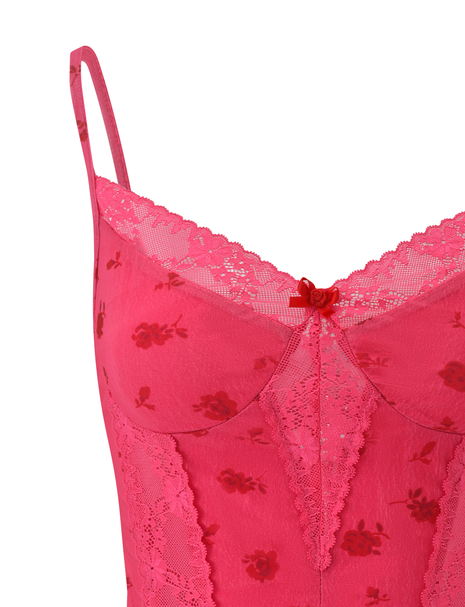 Close-up of the TIGERMIST KHALIA TOP - DITSY FLORAL, showcasing a pink floral bodice with red lace patterns, scalloped lace neckline trim, adjustable straps, and a red bow detail at the center.