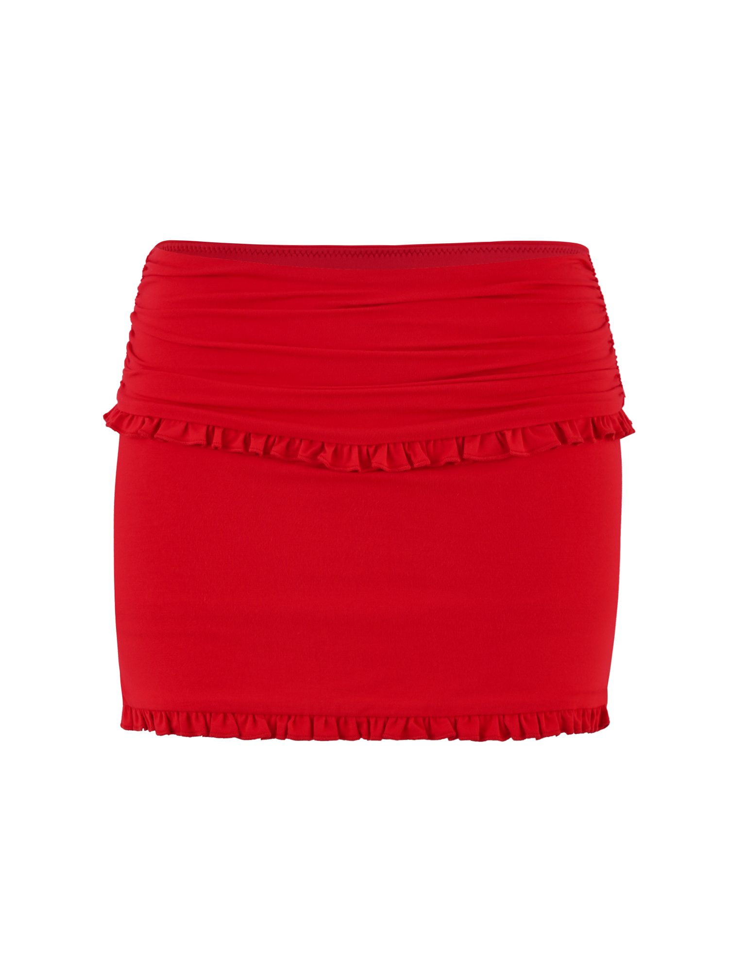 The TIGERMIST GINNY SKORT - RED is a bright red mini skort featuring a ruched waistband and ruffle accents on the top and bottom, designed for a chic bodycon fit.