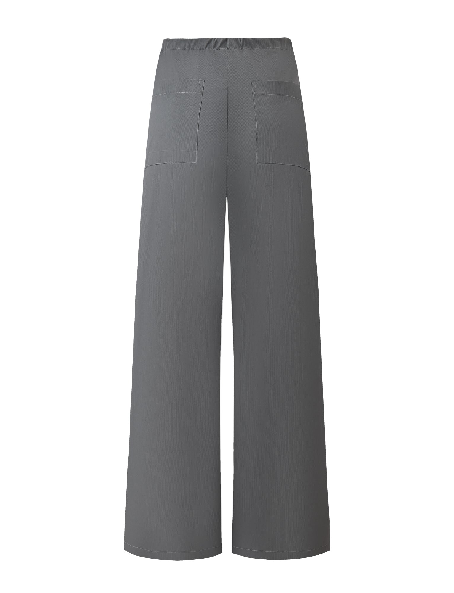 The TYSHA PANT - CHARCOAL by TIGERMIST features a wide-leg design, elastic waistband with drawstring, and two large back pockets. Shown in the back view against a plain white background.