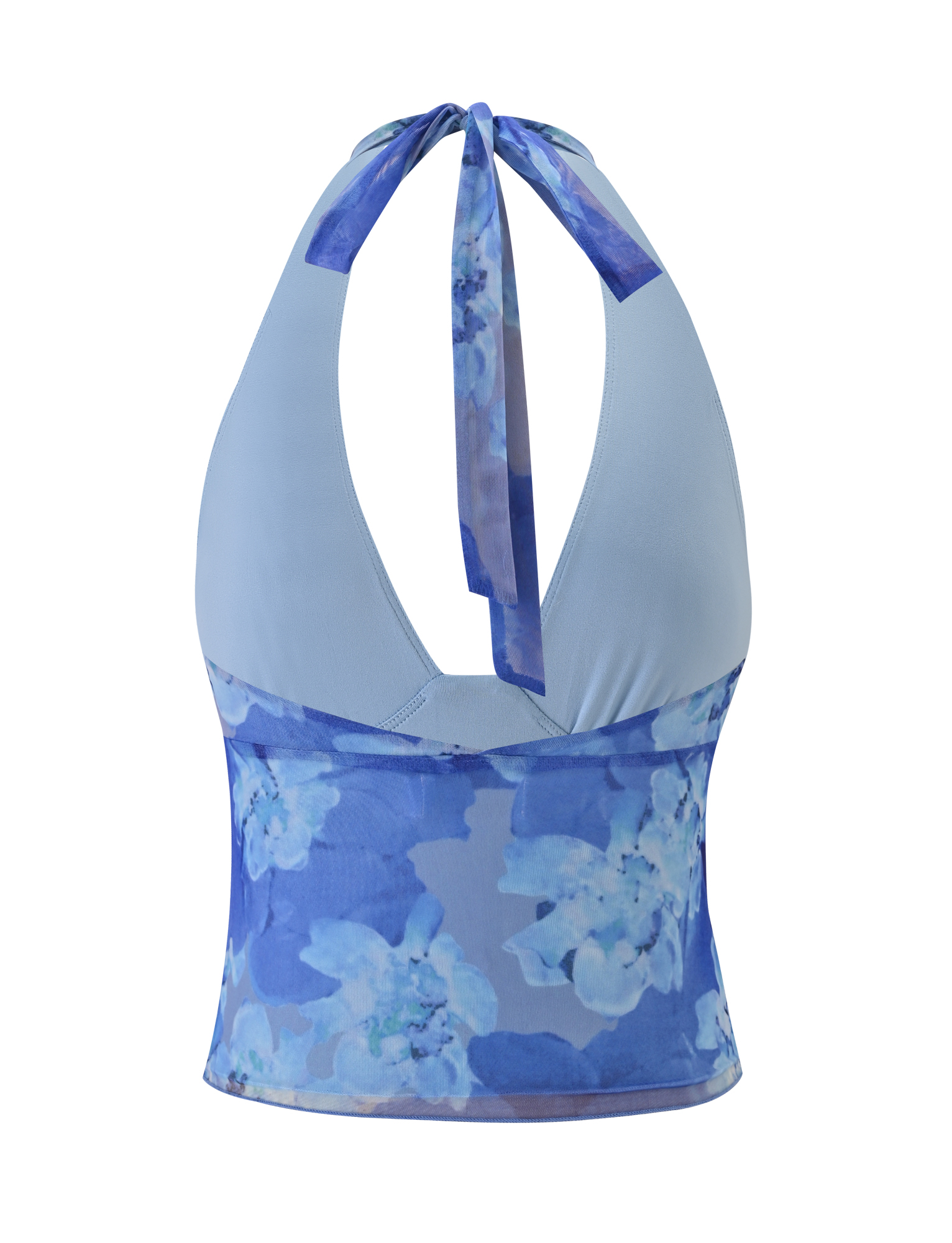 The DEVYN TOP - BLUE MACRO FLORAL by TIGERMIST is a sleeveless halter top with a neck tie, high-stretch fabric, and blue macro floral print on the lower half, shown from the back.