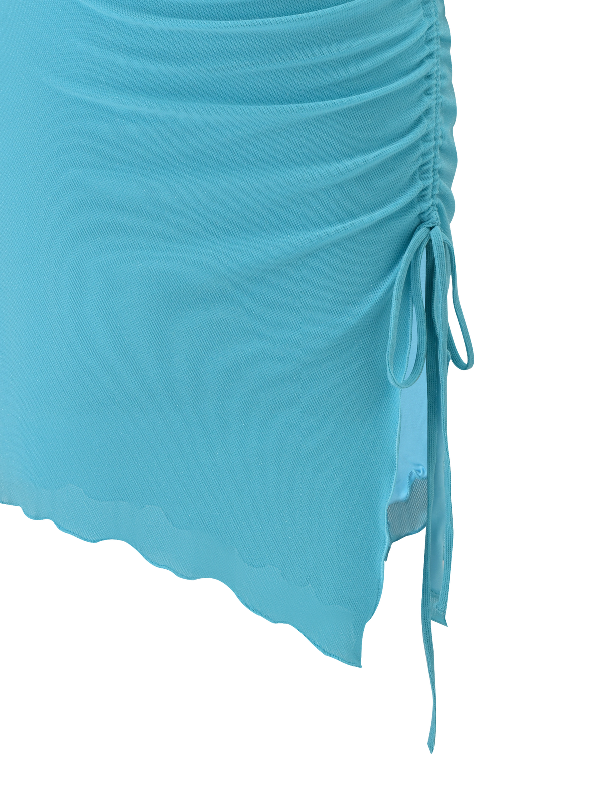 Close-up of the TIGERMIST ELWYN MINI DRESS in blue, a soft, lightweight off-shoulder mini with high-stretch fabric, side ruching tied by bow string, and a wavy asymmetrical hemline.