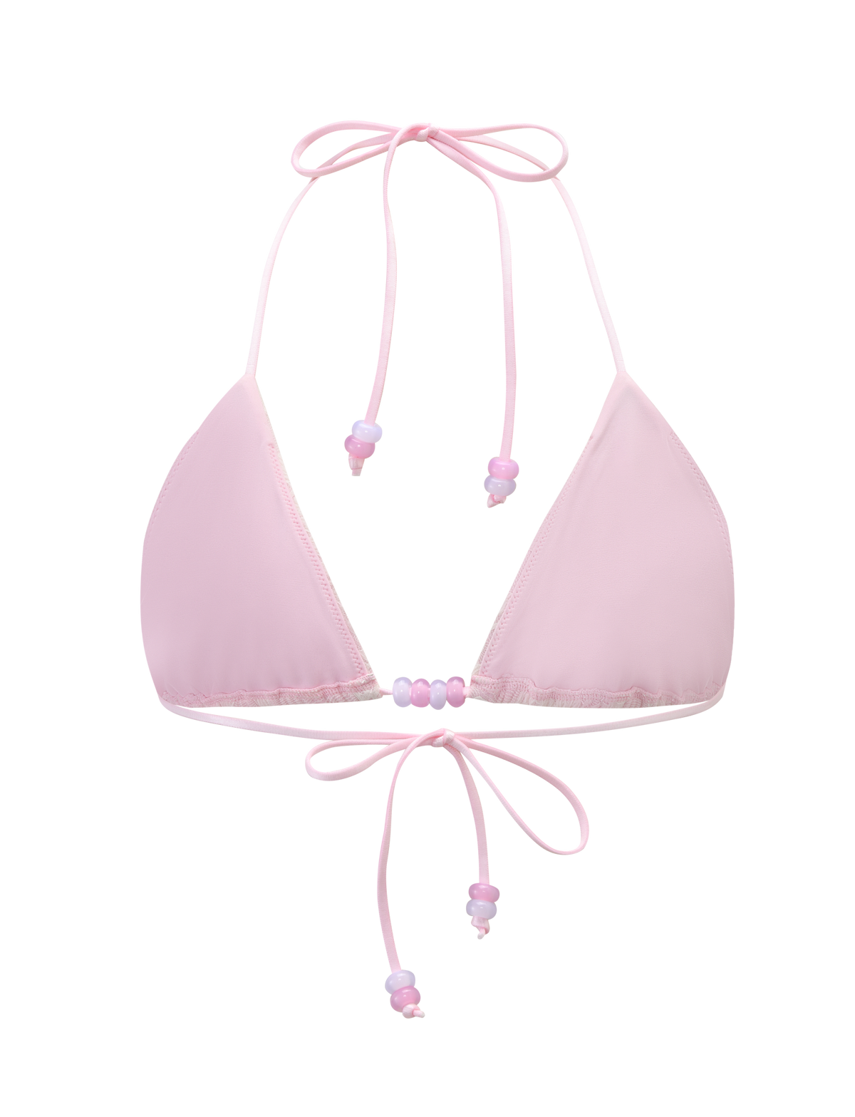 The BRIGITTE BIKINI TOP - IVORY LACE by TIGERMIST features an adjustable halter neck and back ties with delicate pink and purple beads on the strings, adding a playful touch.