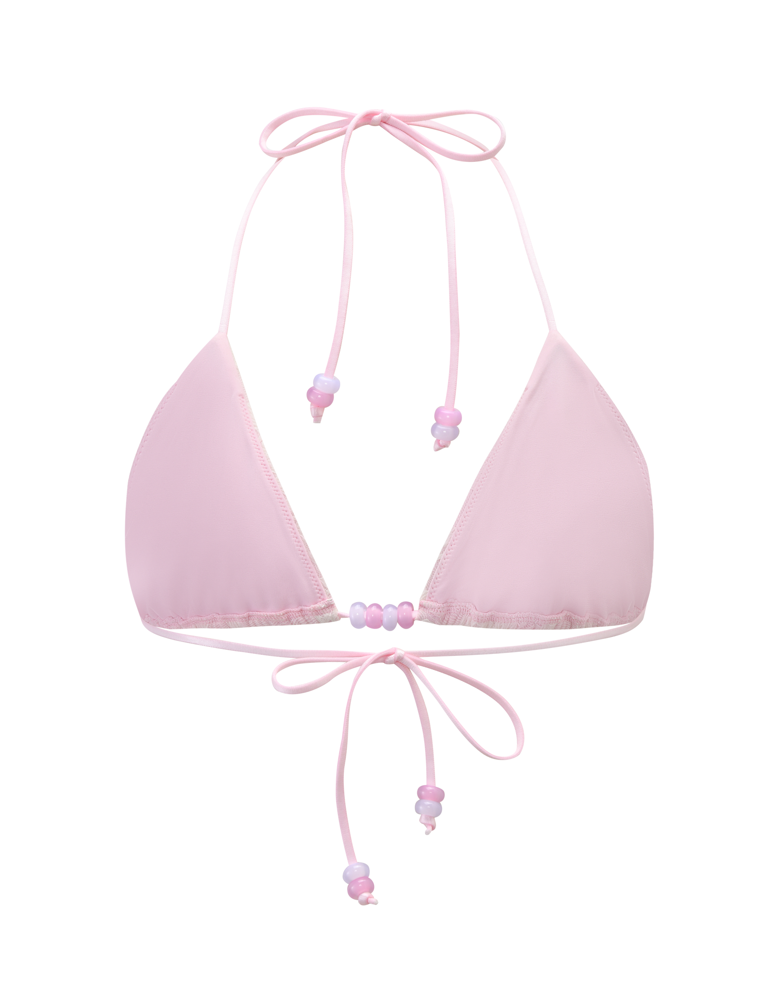 The BRIGITTE BIKINI TOP - IVORY LACE by TIGERMIST features an adjustable halter neck and back ties with delicate pink and purple beads on the strings, adding a playful touch.