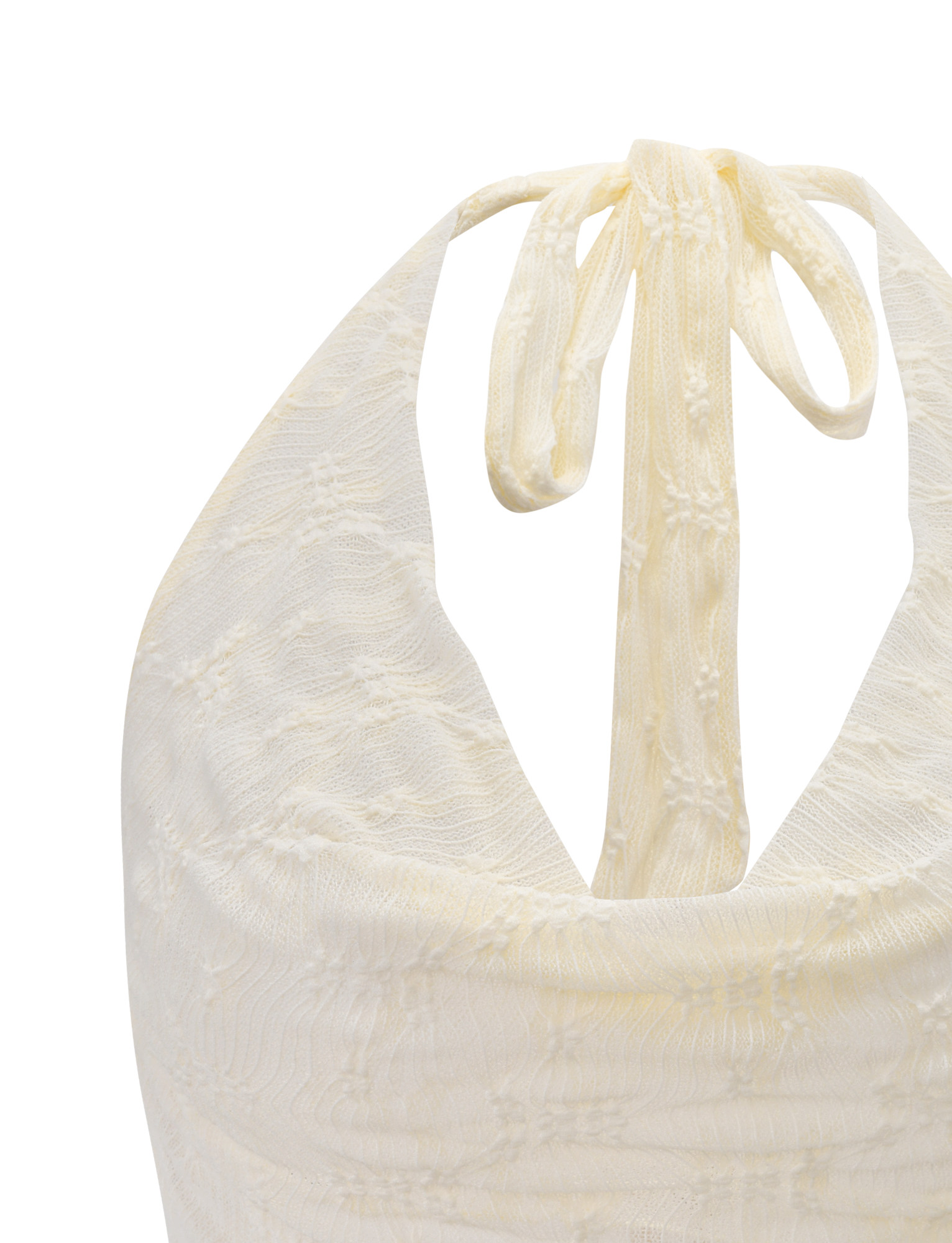 A close-up of the TIGERMIST KATERINA TOP in ivory lace, featuring a delicate floral pattern and halter neck tie, displayed against a plain background.