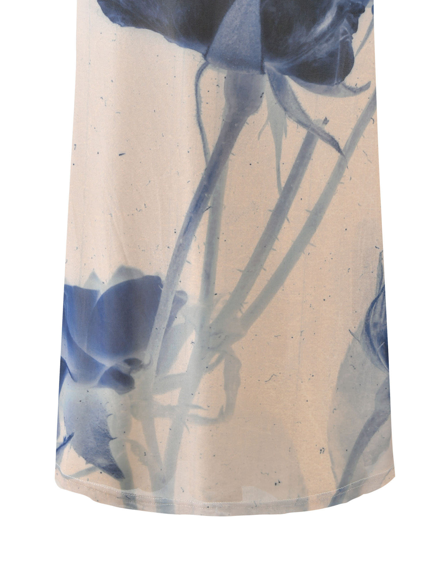 A close-up of the TIGERMIST JANIS MAXI SKIRT - INDIGO FLORAL, showcasing its delicate large floral pattern and soft blue tones.