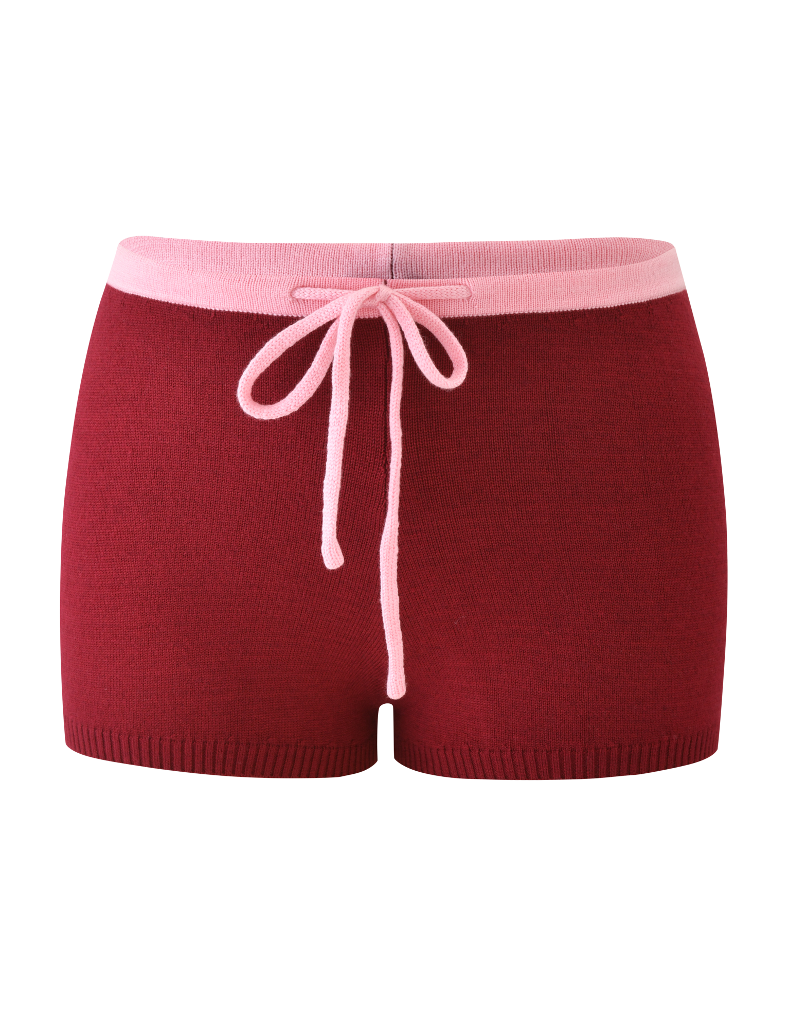 The ROUX SHORT - RED by TIGERMIST features a red knit design with a wide pink waistband, pink front drawstring bow, and an asymmetrical star graphic for a stylish touch.